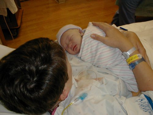Mommy holding me in delviery room 11