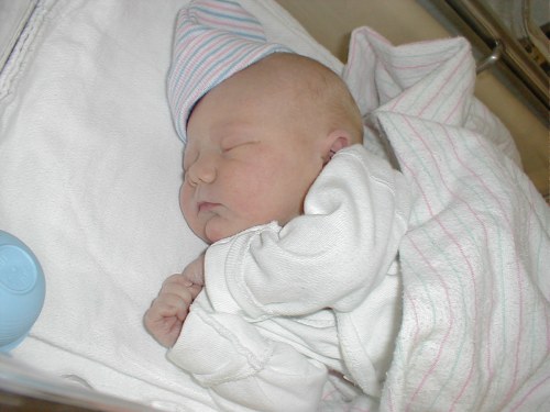 Me sleeping in the hospital again - in my hat!  Taken Nov. 7, 2001.
